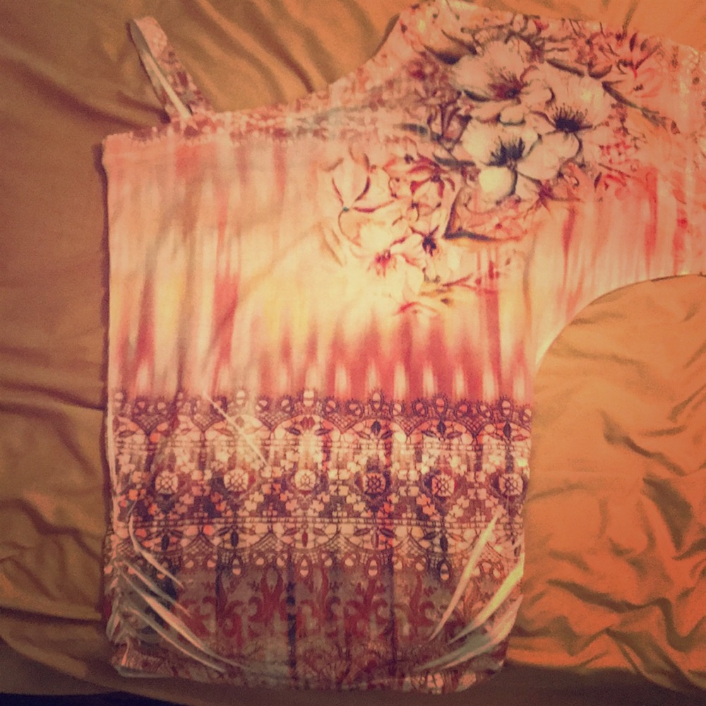Amazing asymmetric printed top, size small.
